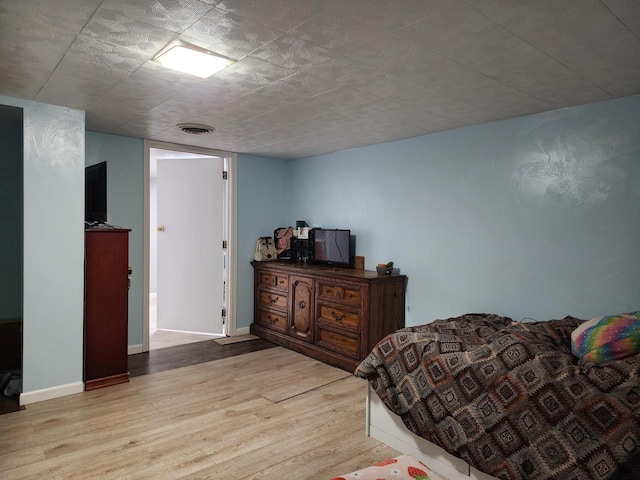 1130 10th St S, Wisconsin Rapids, WI 54494 - bedroom featuring wood finished floors and baseboards