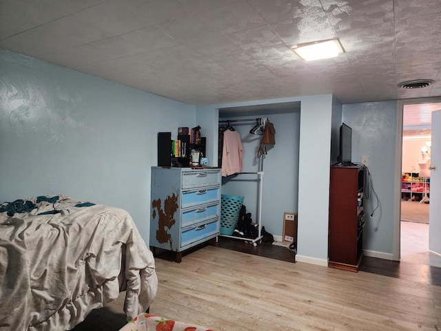 1130 10th St S, Wisconsin Rapids, WI 54494 - bedroom with light wood finished floors and baseboards