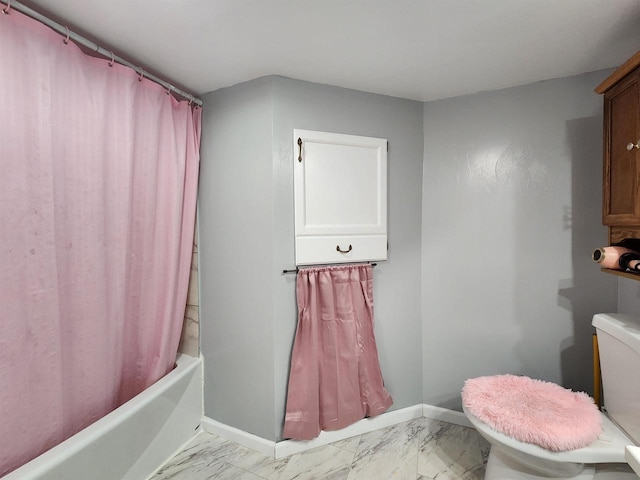 1130 10th St S, Wisconsin Rapids, WI 54494 - bathroom featuring marble finish floors, toilet, shower / bath combo, and baseboards