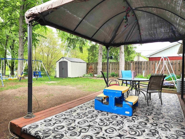 1130 10th St S, Wisconsin Rapids, WI 54494 - view of patio with a playground and outdoor dining space