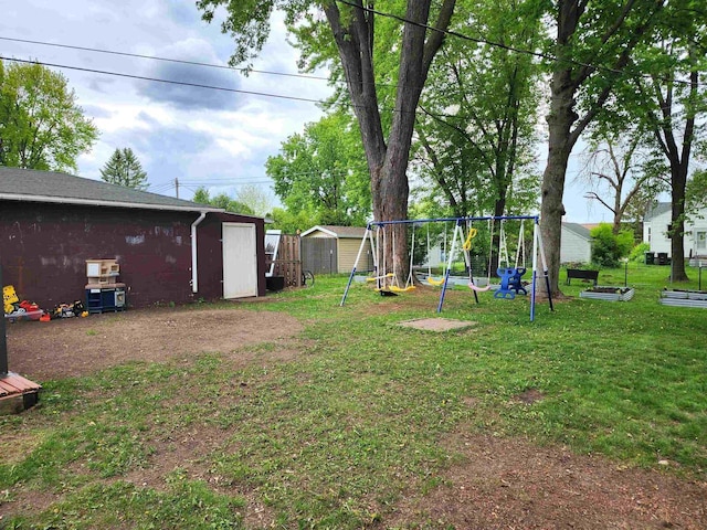 1130 10th St S, Wisconsin Rapids, WI 54494 - view of grassy yard with a playground