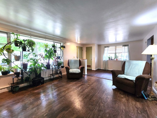 1130 10th St S, Wisconsin Rapids, WI 54494 - sitting room featuring wood finished floors and baseboards