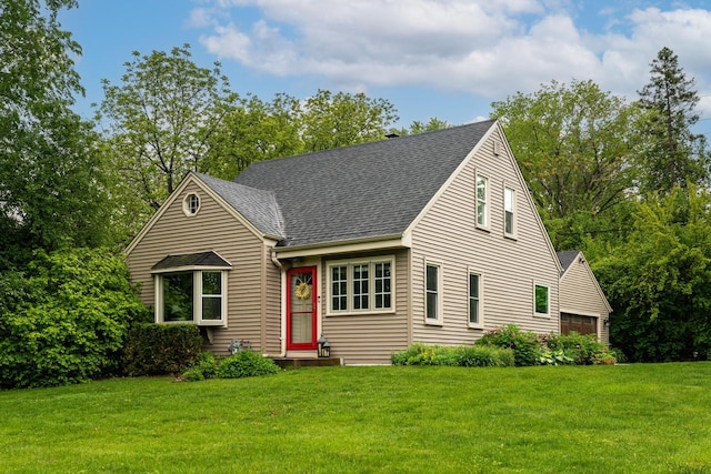 640 Crystal Ln, Elm Grove, WI 53122 - cape cod house with a front yard and roof with shingles