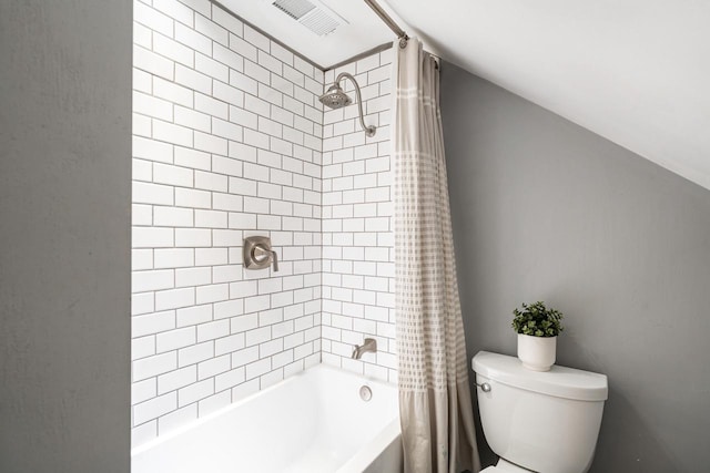 640 Crystal Ln, Elm Grove, WI 53122 - bathroom with shower / bath combo with shower curtain, toilet, and vaulted ceiling