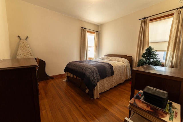 1816 Goodland Ave, Tomah, WI 54660 - bedroom featuring dark wood-type flooring and baseboards