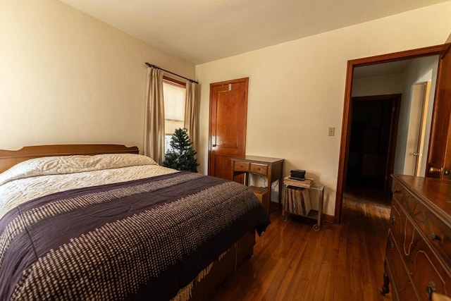 1816 Goodland Ave, Tomah, WI 54660 - bedroom featuring dark wood finished floors and baseboards
