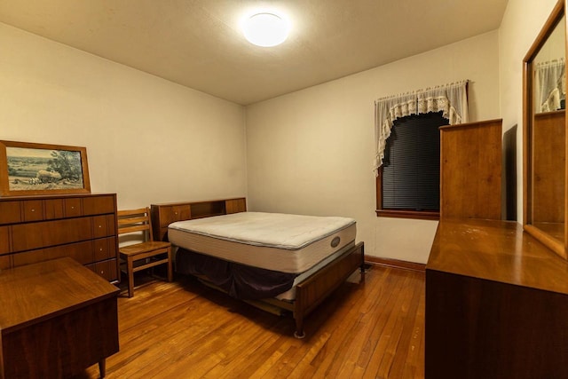 1816 Goodland Ave, Tomah, WI 54660 - bedroom featuring wood-type flooring and baseboards