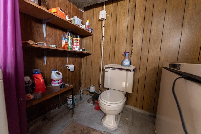 1816 Goodland Ave, Tomah, WI 54660 - bathroom featuring toilet and wood walls