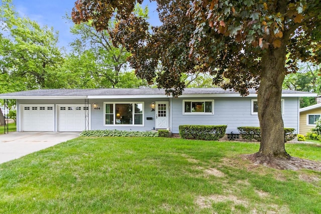 404 W Albert St, Portage, WI 53901 - ranch-style house with a garage, a front yard, and driveway
