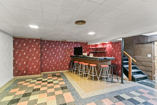 404 W Albert St, Portage, WI 53901 - indoor dry bar featuring baseboards and stairs