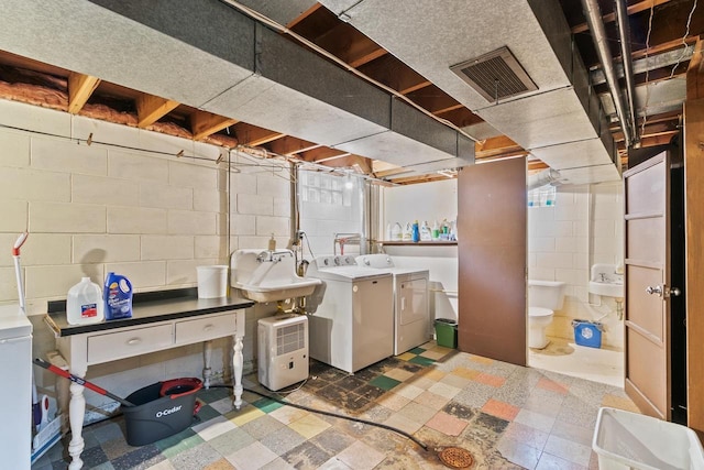 404 W Albert St, Portage, WI 53901 - laundry area with washer and dryer and tile patterned floors
