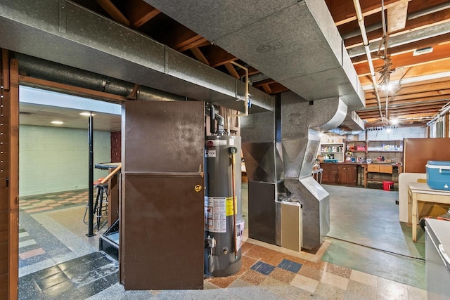 404 W Albert St, Portage, WI 53901 - unfinished basement with water heater and tile patterned floors