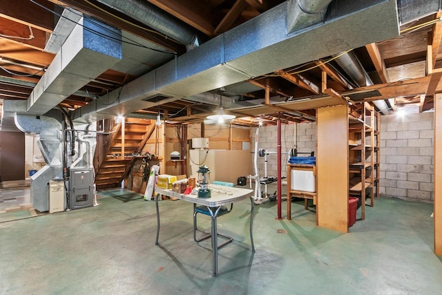 404 W Albert St, Portage, WI 53901 - unfinished below grade area with heating unit, stairs, and concrete block wall