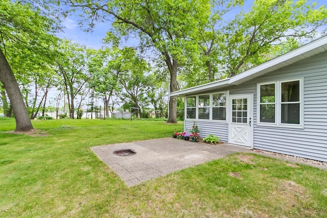 404 W Albert St, Portage, WI 53901 - view of green lawn with a patio