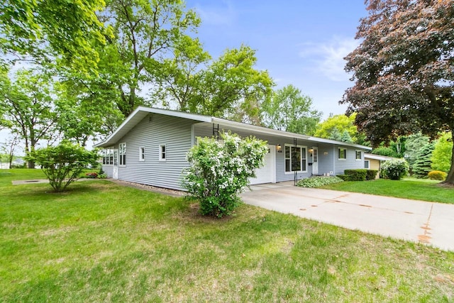 404 W Albert St, Portage, WI 53901 - ranch-style house with a front lawn and driveway