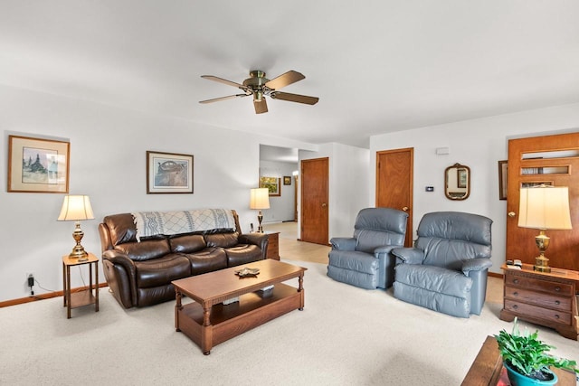 404 W Albert St, Portage, WI 53901 - living area featuring ceiling fan, light carpet, and baseboards