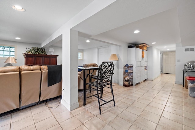 N26W30255 Maple Ave, Pewaukee, WI 53072 - living room with recessed lighting, light tile patterned floors, and baseboards