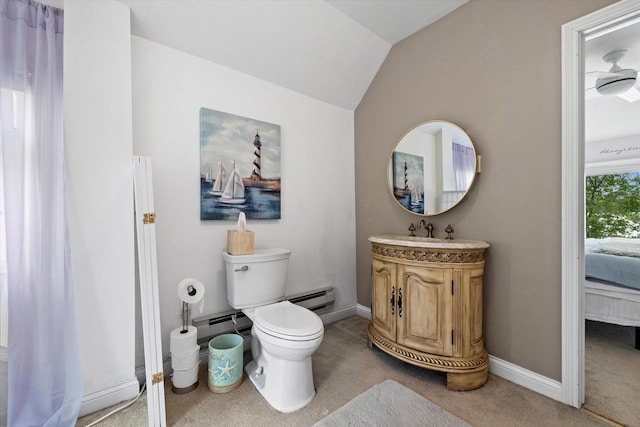 N26W30255 Maple Ave, Pewaukee, WI 53072 - bathroom with vanity, toilet, vaulted ceiling, baseboards, and a baseboard heating unit