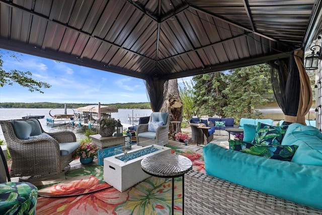 N26W30255 Maple Ave, Pewaukee, WI 53072 - view of patio with an outdoor living space with a fire pit, a water view, and a gazebo