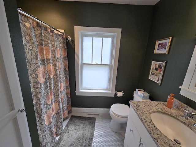 3609 Gregory St, Madison, WI 53711 - full bathroom featuring vanity, toilet, baseboards, and a shower with curtain