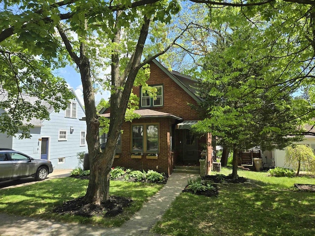 3609 Gregory St, Madison, WI 53711 - view of front of house featuring brick siding and a front yard