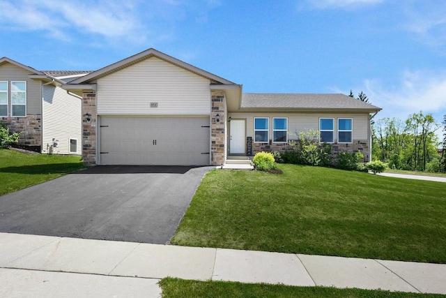 972 Margarets Way, Belleville, WI 53508 - ranch-style house featuring stone siding, driveway, a front yard, and an attached garage