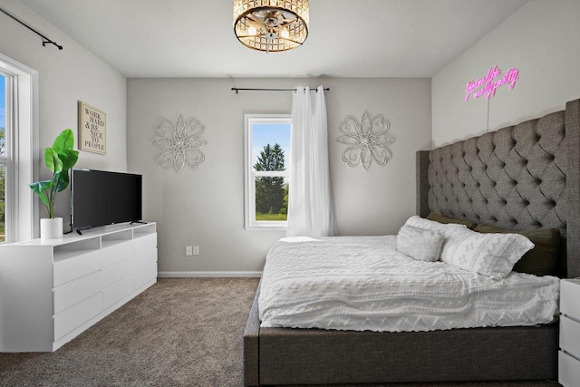 972 Margarets Way, Belleville, WI 53508 - bedroom featuring carpet floors, a chandelier, and baseboards