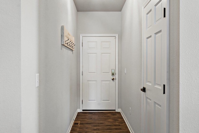 972 Margarets Way, Belleville, WI 53508 - doorway to outside with dark wood-style flooring and baseboards