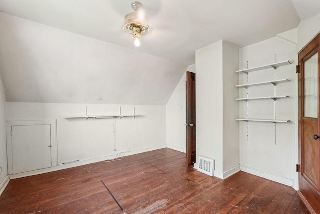 4182 N 13th St, Milwaukee, WI 53209 - additional living space featuring hardwood / wood-style flooring, vaulted ceiling, and baseboards