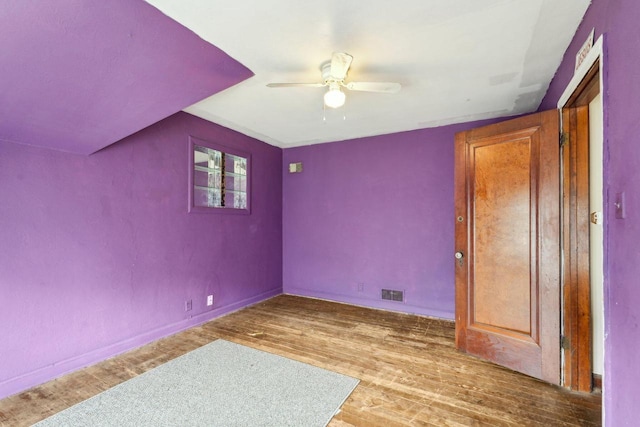 4182 N 13th St, Milwaukee, WI 53209 - spare room featuring a ceiling fan, wood finished floors, and baseboards