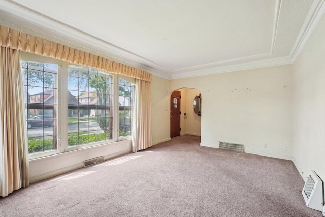 4182 N 13th St, Milwaukee, WI 53209 - spare room featuring arched walkways, carpet, crown molding, and baseboards