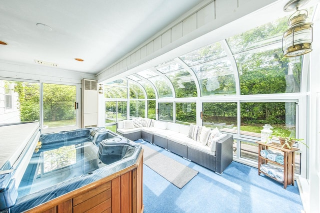 12105 W Shawnee Pass, Mequon, WI 53097 - sunroom with a hot tub and an outdoor living space