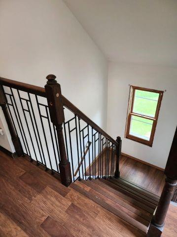 1561 240th Ave, Luck, WI 54853 - staircase with wood finished floors and baseboards