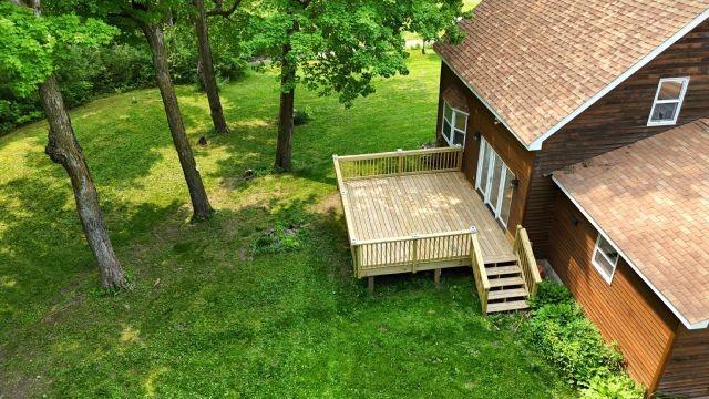 1561 240th Ave, Luck, WI 54853 - wooden terrace with a lawn