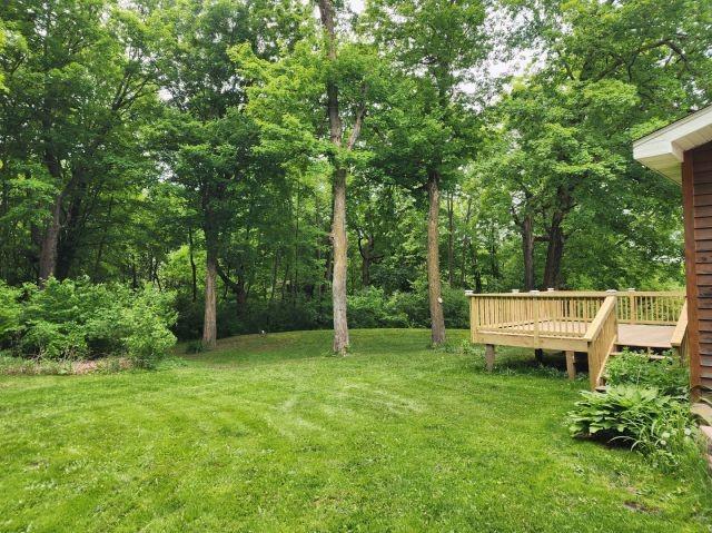 1561 240th Ave, Luck, WI 54853 - view of grassy yard featuring a deck
