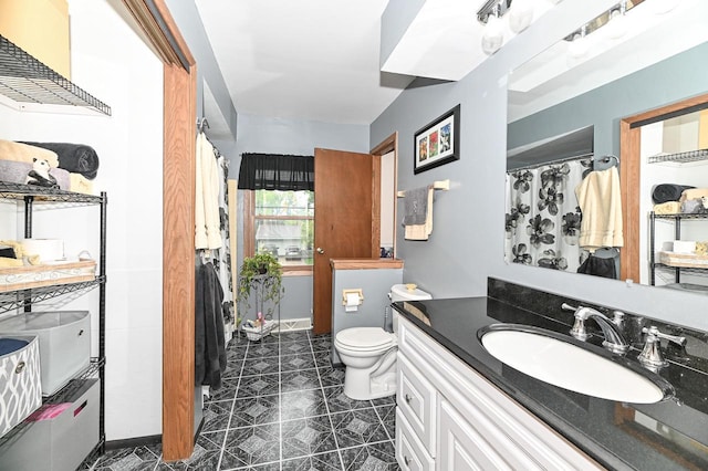 7538 S 74th St, Franklin, WI 53132 - full bath featuring vanity, toilet, tile patterned floors, and a shower with shower curtain