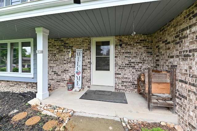 7538 S 74th St, Franklin, WI 53132 - property entrance featuring brick siding and a porch