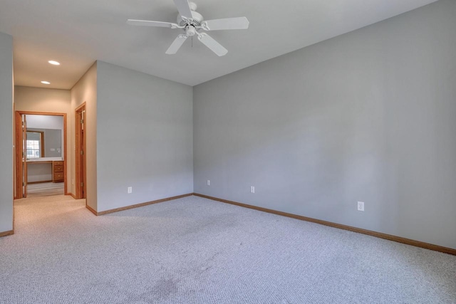 W159N4872 Graysland Dr, Menomonee Falls, WI 53051 - empty room featuring baseboards, light carpet, and recessed lighting