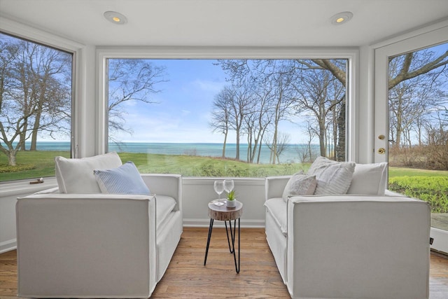 4696 N Lake Dr, Whitefish Bay, WI 53211 - sunroom / solarium featuring a water view