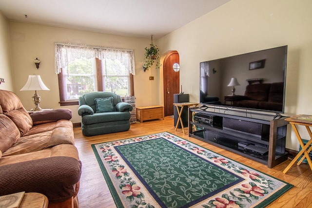 917 Whitewater Ave, Fort Atkinson, WI 53538 - living area featuring wood finished floors and arched walkways