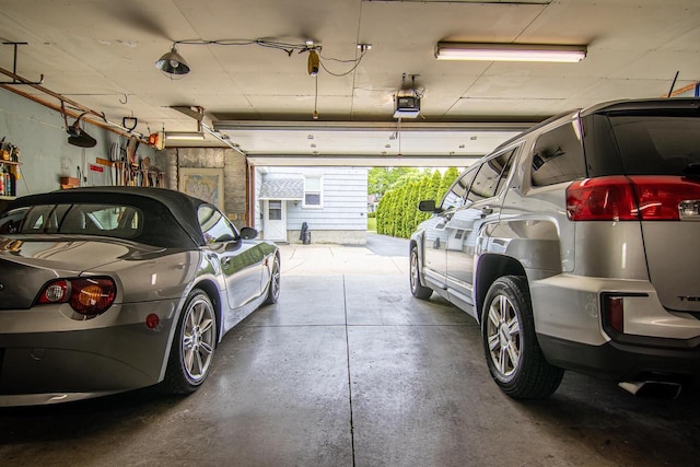 917 Whitewater Ave, Fort Atkinson, WI 53538 - garage featuring a garage door opener