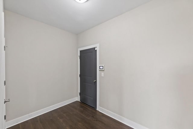 529 Century Oak Dr, Waukesha, WI 53188 - unfurnished room featuring baseboards and dark wood finished floors