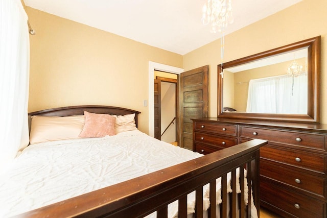 150 S James St, Waukesha, WI 53186 - bedroom featuring a chandelier