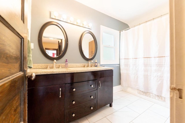 150 S James St, Waukesha, WI 53186 - bathroom with double vanity, tile patterned floors, and shower / bath combination with curtain