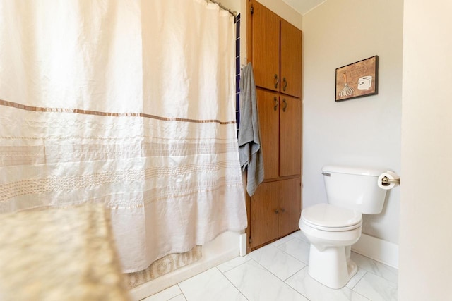150 S James St, Waukesha, WI 53186 - bathroom with toilet and a shower with shower curtain