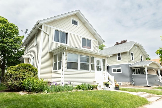 150 S James St, Waukesha, WI 53186 - view of front of home featuring a front yard and entry steps