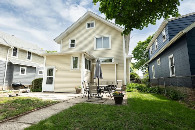 150 S James St, Waukesha, WI 53186 - back of property featuring a patio area