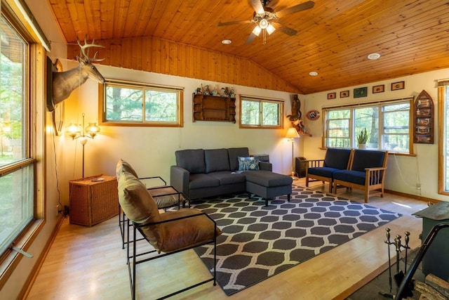W2761 49th St, Mauston, WI 53948 - living room featuring lofted ceiling, wood finished floors, wood ceiling, ceiling fan, and baseboards