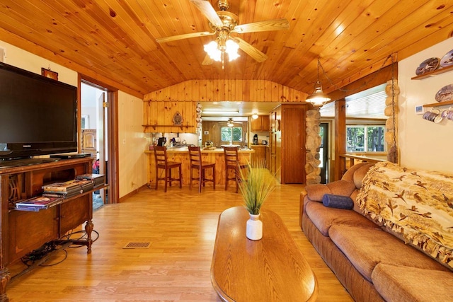 W2761 49th St, Mauston, WI 53948 - living room with lofted ceiling, ceiling fan, light wood finished floors, and wood ceiling