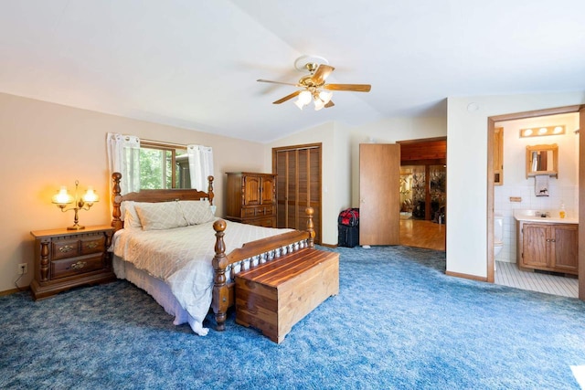 W2761 49th St, Mauston, WI 53948 - bedroom featuring carpet, lofted ceiling, a ceiling fan, and ensuite bath